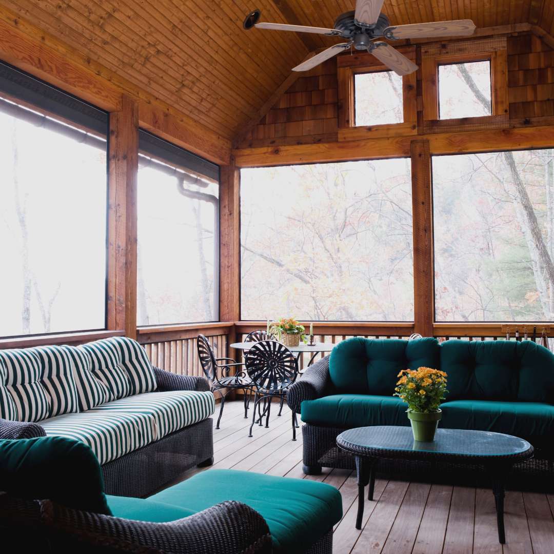 screened in porch with couch